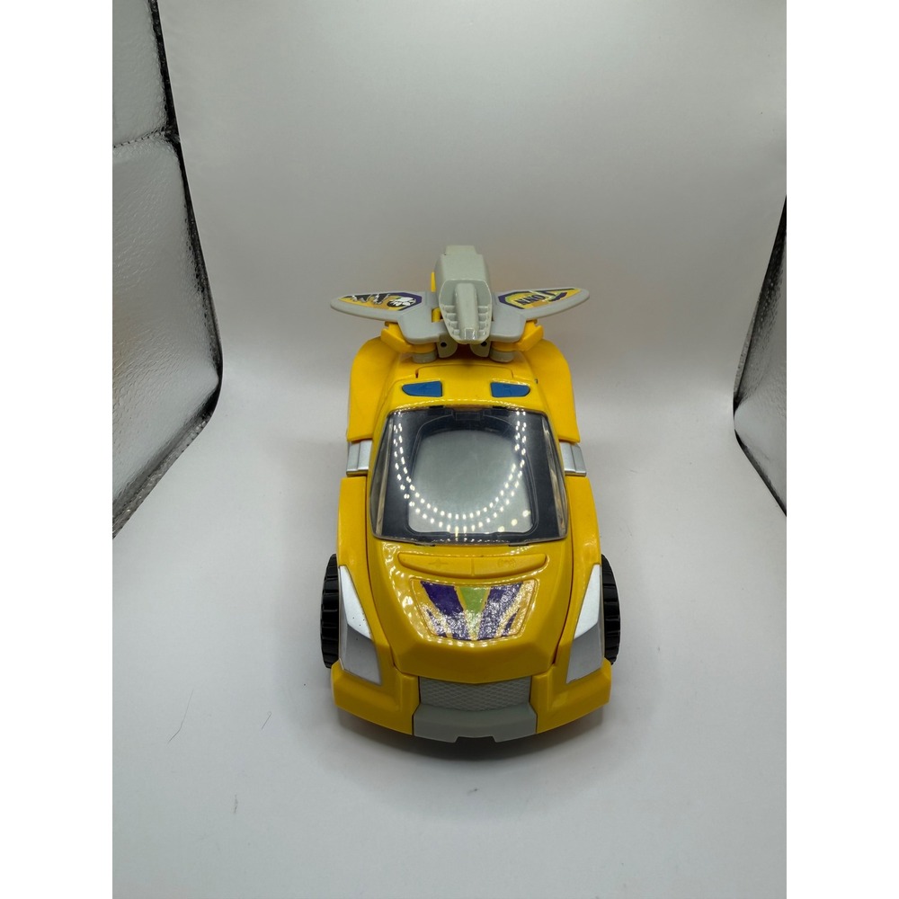VTech Switch & Go‎ Dinos Tonn the Stegosaurus Yellow Race Car Transformer Toy